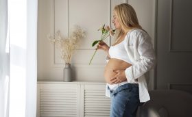 side-view-pregnant-woman-spending-time-indoors